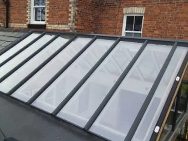 Mr & Mrs E, West Kirby, Wirral : Close up of an installation off an Aluminium spared ATS roof system double glazed celsius glass fitted onto an existing timber spars.